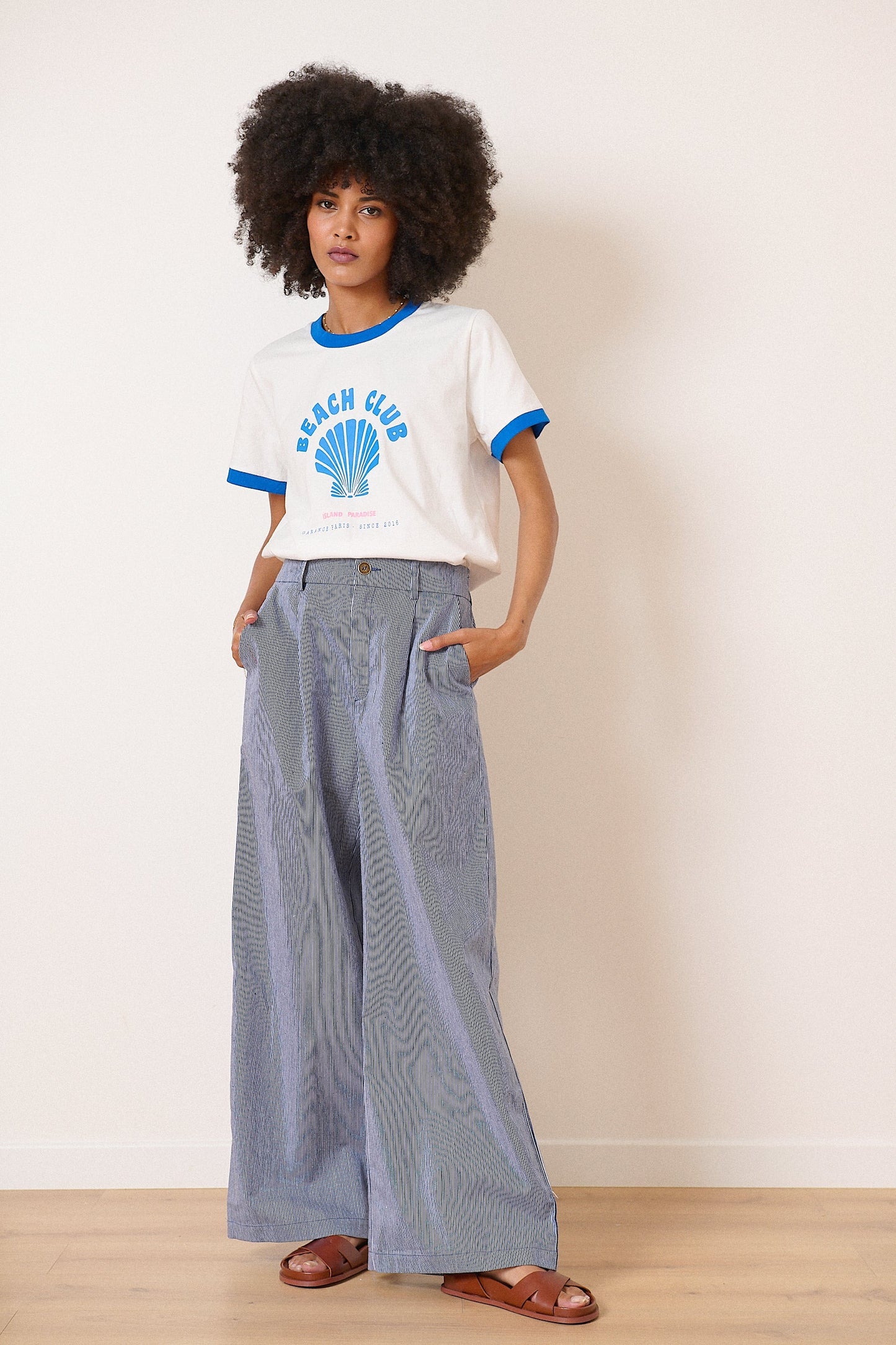 Pantalon en coton taille haute coupe large motif à rayures vêtement femme collection printemps