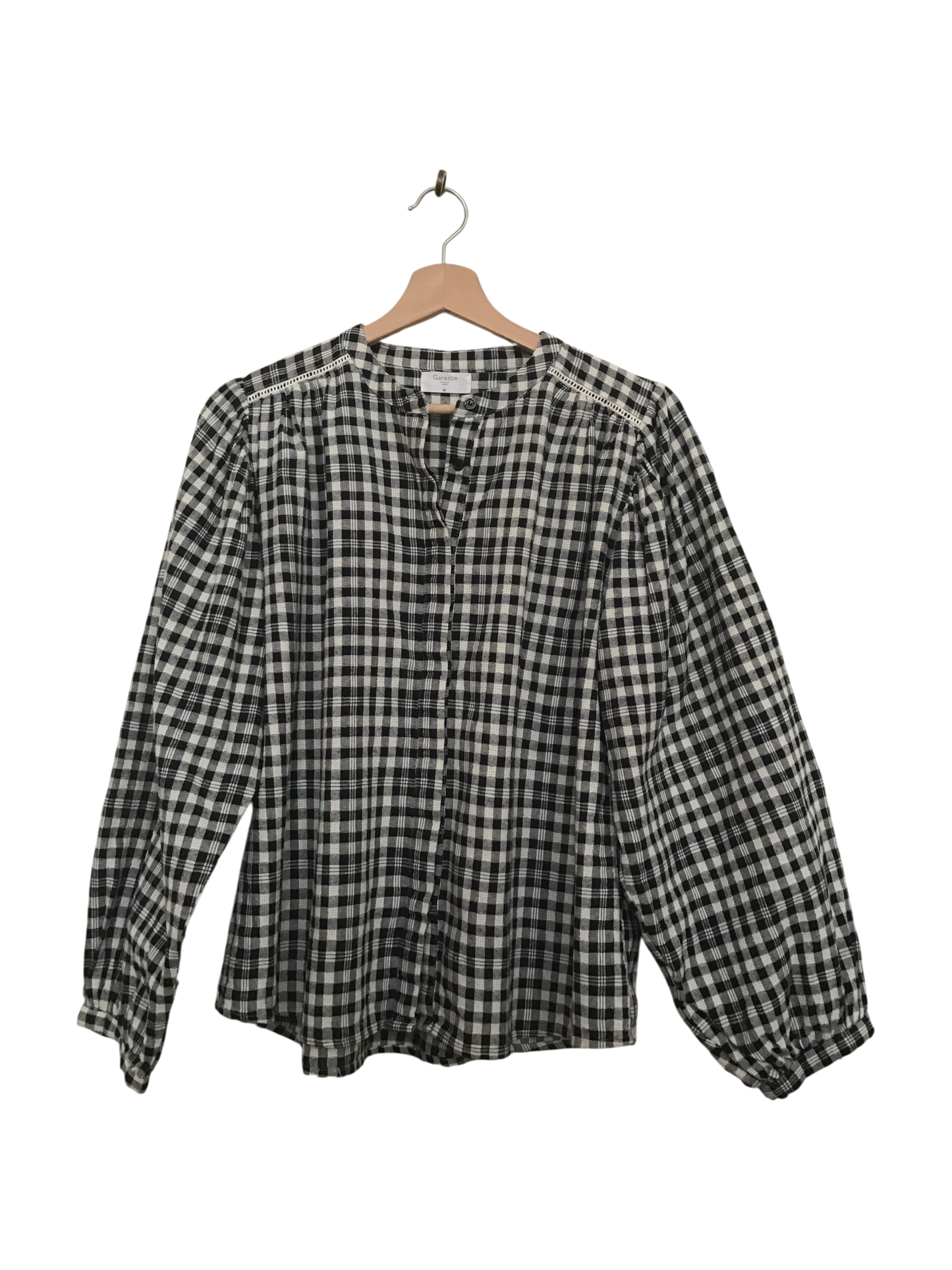 Charmante blouse à carreaux noir et blanc très tendance pour hiver 2026