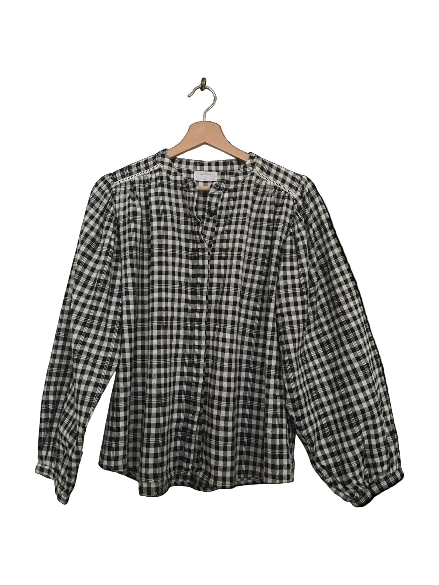 Charmante blouse à carreaux noir et blanc très tendance pour hiver 2026