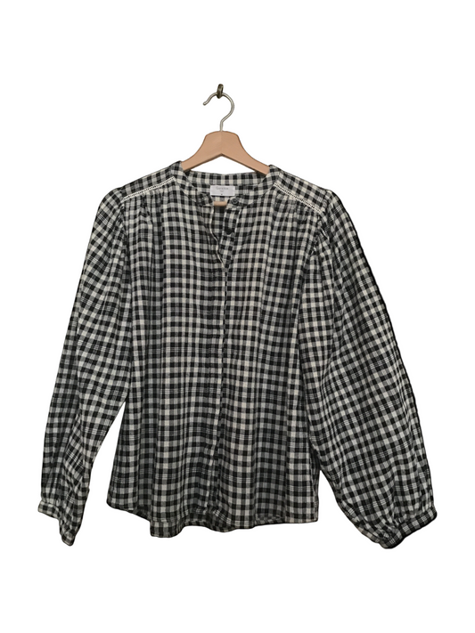 Charmante blouse à carreaux noir et blanc très tendance pour hiver 2026