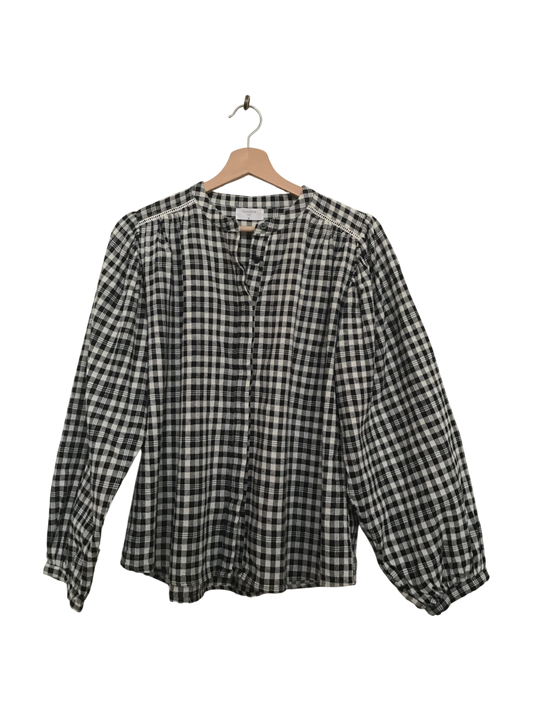 Charmante blouse à carreaux noir et blanc très tendance pour hiver 2026